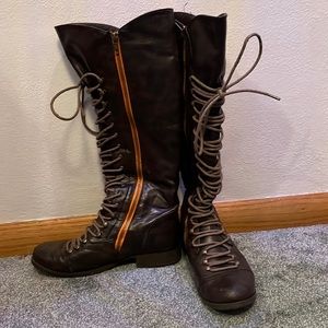 Brown boots with orange size zipper